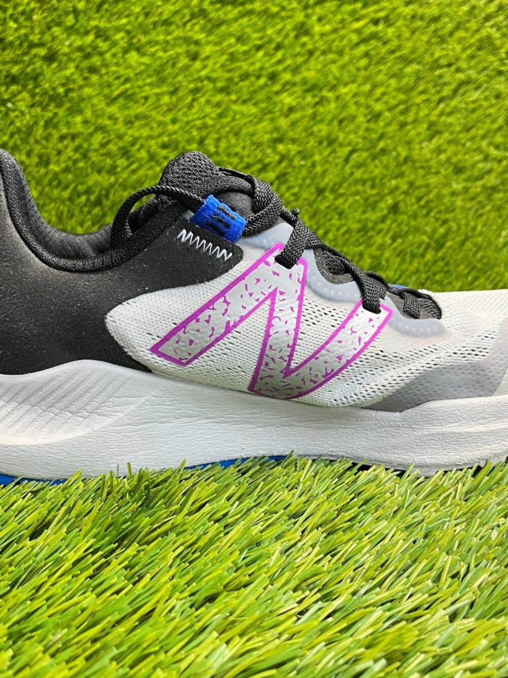 New Balance Women's White, Black & Pink All-Terrain Sneakers - Picture 5 of 11